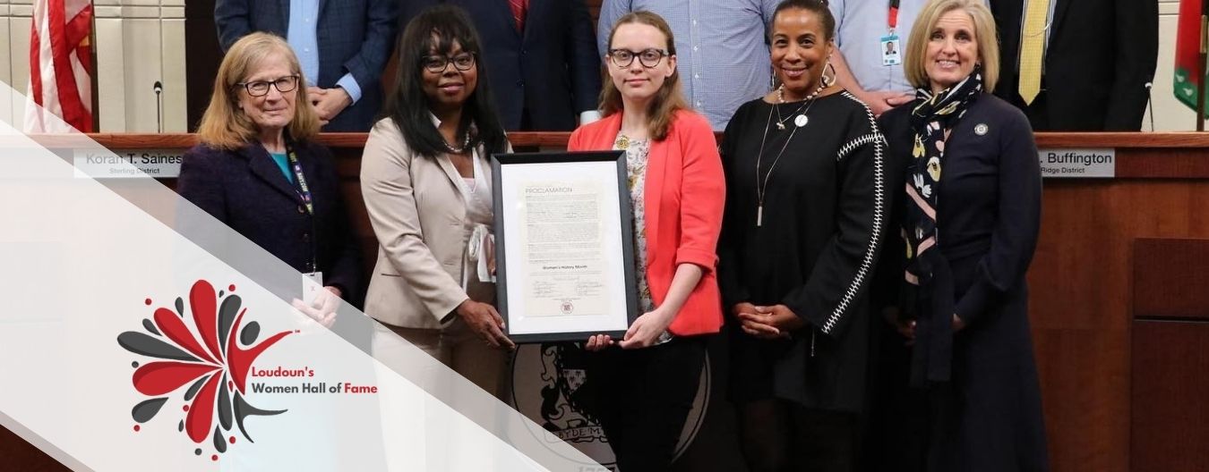 13 – LCWAG Establishes Loudoun County’s First-Ever Women’s Hall of Fame The image features members of the Loudoun Coalition Women and Girls, with the organization’s logo and the Loudoun Women’s Hall of Fame logo displayed in the foreground.