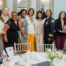 The women of LCWAG lined up smiling at the camera for the Biennial Loudoun Women's Hall of Fame